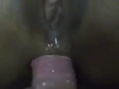 In a homemade film, I fill my ebon wife's black hole with jism.